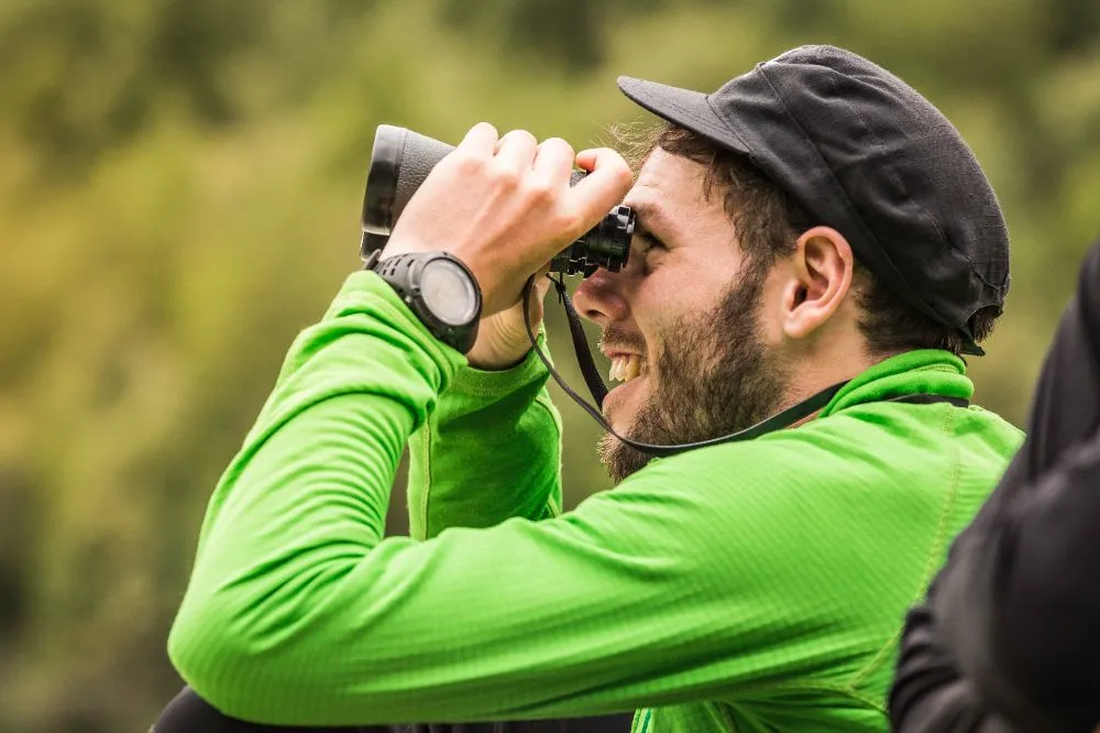 Birdwatchers observing migratory species at Poda Protected Area near Burgas